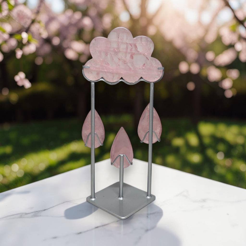 Rose quartz rain cloud crystal sculpture on metal stand with hanging teardrops