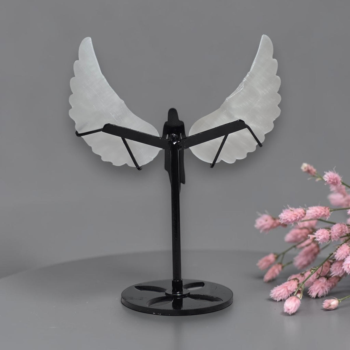 Back view of selenite angel wings and stand