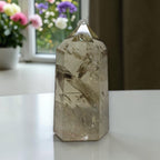 Smoky quartz tower with natural inclusions detail