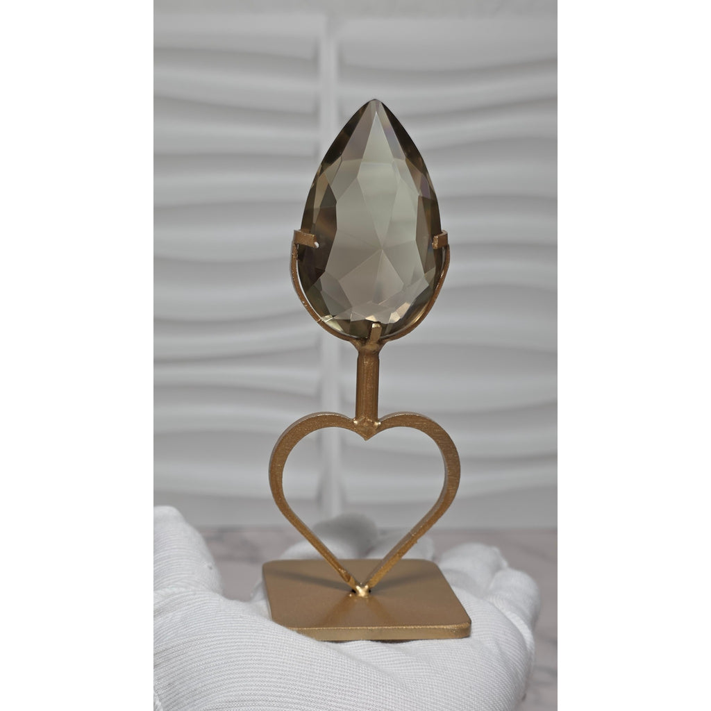Smoky quartz teardrop crystal with open heart metal stand