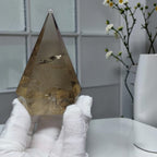 Smoky quartz faceted pyramid tower front view