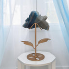 Natural Trolleite rose carving on gold flower stand, back view showing stone texture and stand design