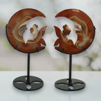 Two banded agate moon fairy sculptures showing natural color variation between pieces